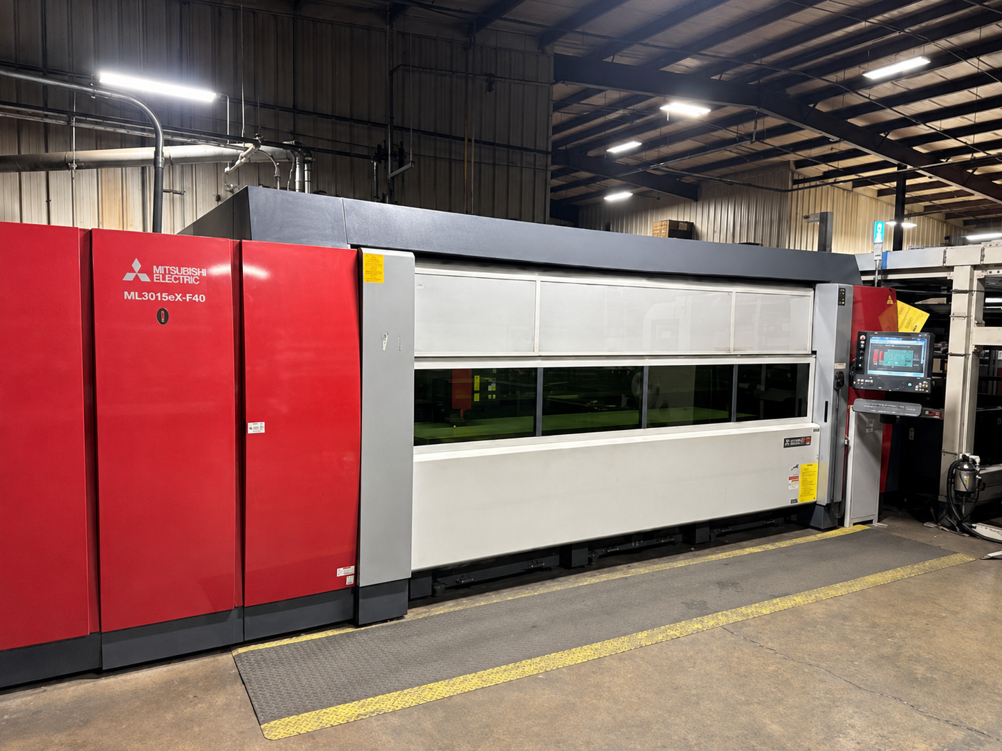 Fiber laser cutting center on the Fusion Dynamics factory floor